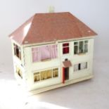 An "Appletree Cottage" doll's house and furniture