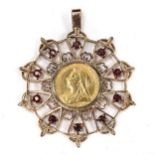 A Queen Victoria 1899 full sovereign gold coin, in large 9ct gold garnet openwork pendant mount,
