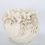 Belleek porcelain jardiniere encrusted with flowers, black back stamp, height 19cm, diameter