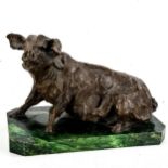 A patinated Studio bronze sculpture of a pig, unsigned on green marble base, length 34cm