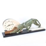 An large Art deco marble faced clock with a bronzed spelter panther figure, length 77cm