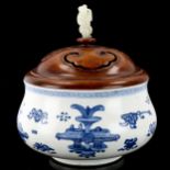 A Chinese Kangxi blue and white porcelain lidded censer, of bulbous circular form, with painted
