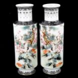 A pair of Chinese white glaze porcelain sleeve vases, with painted exotic birds and text, seal marks