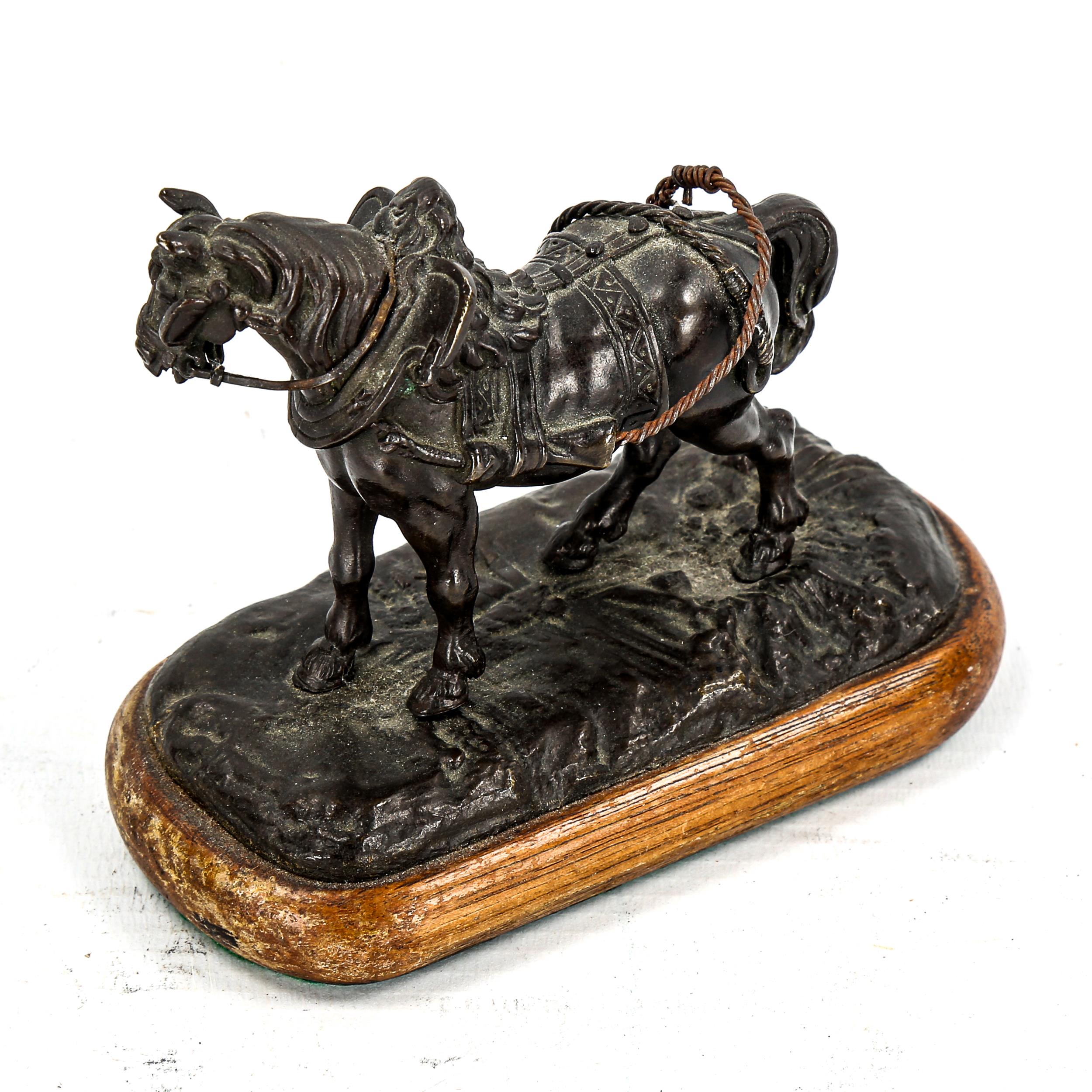 A small 19th century patinated bronze sculpture of a saddled horse, unsigned, length 11cm - Image 2 of 3