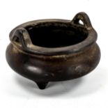 A Chinese patinated bronze incense burner, impressed seal mark under base, diameter 14cm General