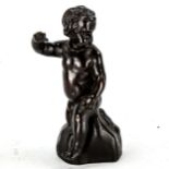 A 19th century patinated bronze sculpture of a Classical putti, unsigned, height 17cm