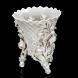 A small Belleek footed spill vase, circa 1891 - 1926, height 8cm Tiny rim chip