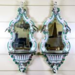 A large pair of Continental porcelain framed wall brackets, probably late 19th century, with inset