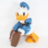Vintage composition figure of Donald Duck with his suitcase, height 48cm