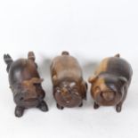 3 modern Chinese carved hardwood pigs, length 20cm