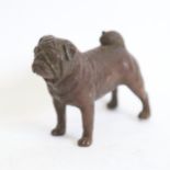 A miniature bronze pug dog, unsigned, length 7cm