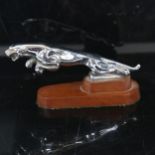 A Vintage chrome plated Jaguar car mascot on plinth, length 20cm