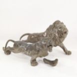 A Chinese spelter lion sculpture, and similar tiger (1 leg detached)