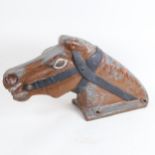 An early 20th century painted cast-iron fairground merry-go-round horse head