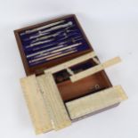An Antique rosewood-cased set of drawing instruments, including rulers