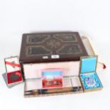 A 19th century brass-bound rosewood sewing box, containing Chinese calligraphy items, including