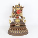 A large Chinese hand painted and gilded patinated bronze seated Buddha, on double-lotus base,