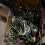 A quantity of brass items, including horse brasses, candlesticks, oil lamps etc (boxful)