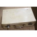 A Vintage white leather suitcase