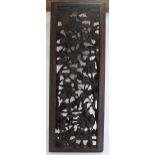A large Chinese carved and pierced hardwood panel, depicting soldiers on horseback, 100cm x 36cm