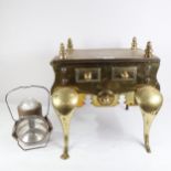 George III cast-brass footman, and an Eveready lantern (2)