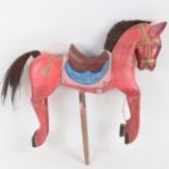 An Oriental carved and painted wood horse puppet, length 36cm