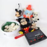 A nursery tea set, and a box of toys, including Mickey Mouse, and a mid-century hand-held stunt bike