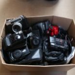 A large quantity of Vintage cameras and accessories, including Yashica, Olympus, Canon, Pentax