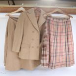 A Jaeger of London short wool jacket, size 12, 2 Jaeger wool skirts, both size 12, and a County