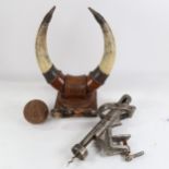 WITHDRAWN - Rapid bar-top corkscrew, cannonball, and cattle horn desk ornament (3)