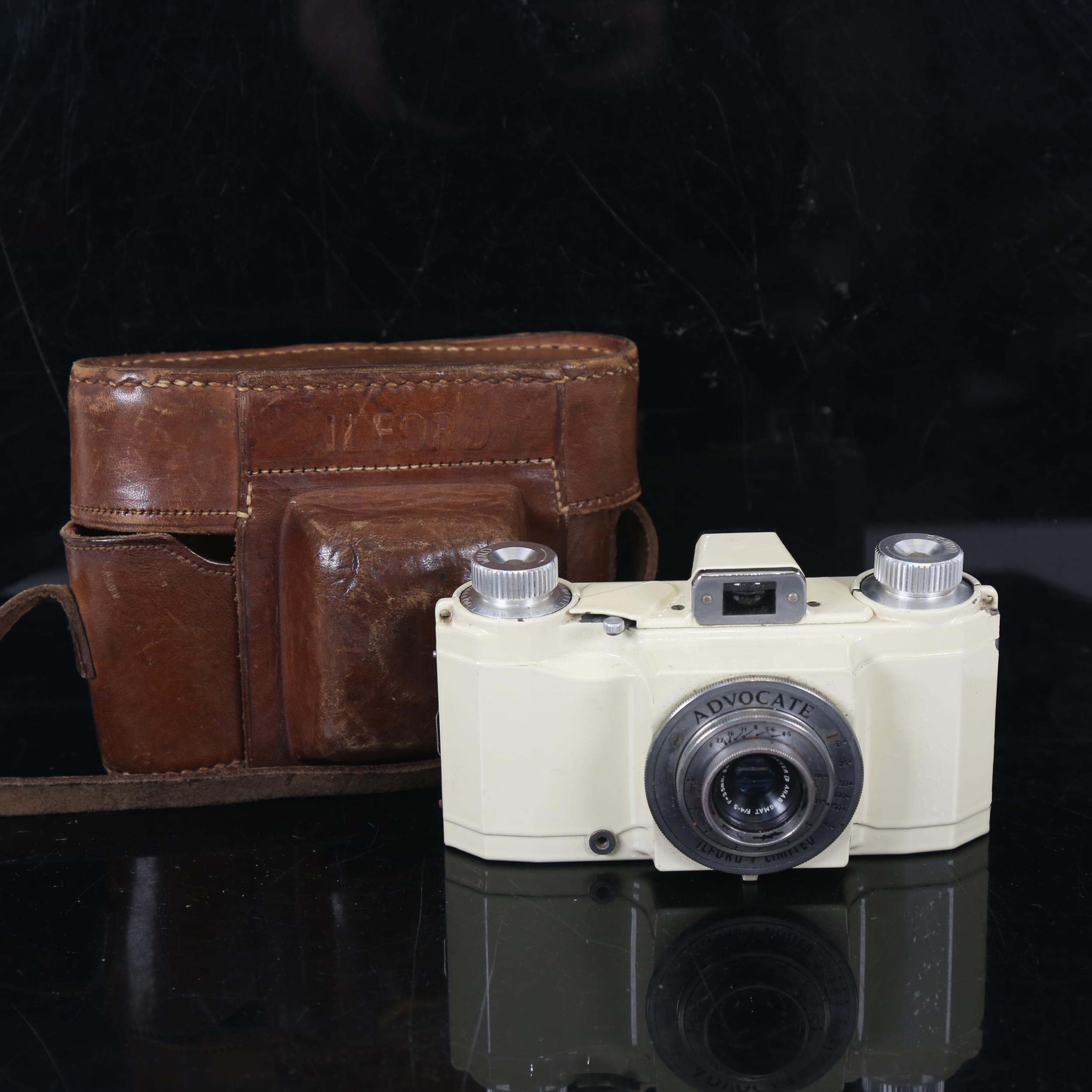 ADVOCATE - a Vintage cream 35mm camera, with Dallmeyer F/4.5 lens, and Ilford leather carrying case