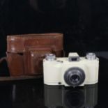 ADVOCATE - a Vintage cream 35mm camera, with Dallmeyer F/4.5 lens, and Ilford leather carrying case