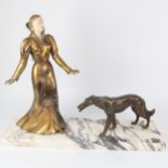 A Vintage Continental patinated spelter figure of a lady with a hound, on coloured marble plinth,