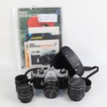 A Pentax SLR Spotmatic F camera, with screw-fit Pentax Takumar 35mm lens, and 2 extra lenses, a