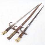 3 Antique French bayonets, including 1879 and 1880 patterns, largest blade length 57cm (3)