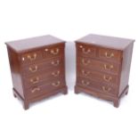 A pair of reproduction mahogany chests of 2 short and 3 long drawers, W62cm, H75cm, D41cm