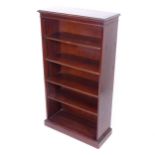 A reproduction mahogany bookcase with 4 adjustable shelves, W76cm, H138cm, D31cm