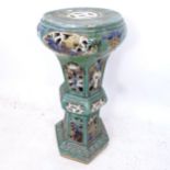 A Victorian pottery green glaze jardiniere stand, W36cm, H77cm (1 panel A/F)