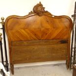 A 19th century French walnut bed-head, with carved pediment Probably late 19th century only, some