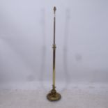 An Edwardian brass telescopic standard lamp, converted to electric