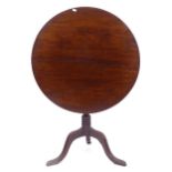 A Georgian mahogany circular tilt-top table, on tripod base, diameter 74cm, H106cm