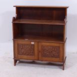 An Edwardian oak hanging open cabinet, with 2 carved panelled doors, of small size, W51cm, H56cm,