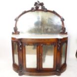 A Victorian walnut bow-front chiffonier, with raised mirror-back, shaped marble top, and mirrored