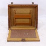 An early 20th century oak hanging writing slope, W48cm, H41cm