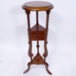 A mahogany wig stand on tripod base, with 2 drawers, W26cm, H87cm