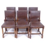 A set of 6 oak and leather seated dining chairs