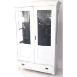 A white painted pine display cabinet with 2 fixed shelves, glazed panelled doors and sides, and