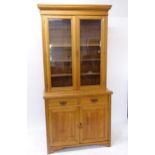 A Victorian golden oak 2-section library bookcase, lower section having 2 fitted drawers and