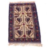 A blue ground Persian design rug, 142cm x 90cm
