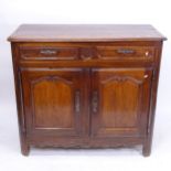 An 18th century oak sideboard, with 2 frieze drawers and cupboards under, with key, W125cm,